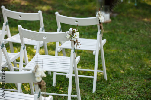 White chairs for wedding ceremony