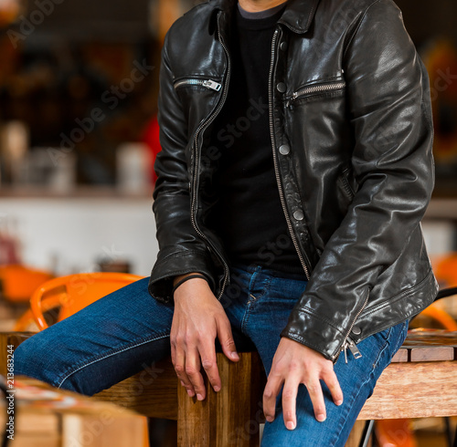 Cropped Head Caucasian Man in casual T-Shirt and leather jacket
