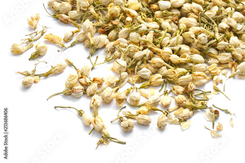 Dried jasmine flowers isolated on white photo