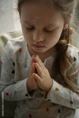 Religious Christian girl pr...