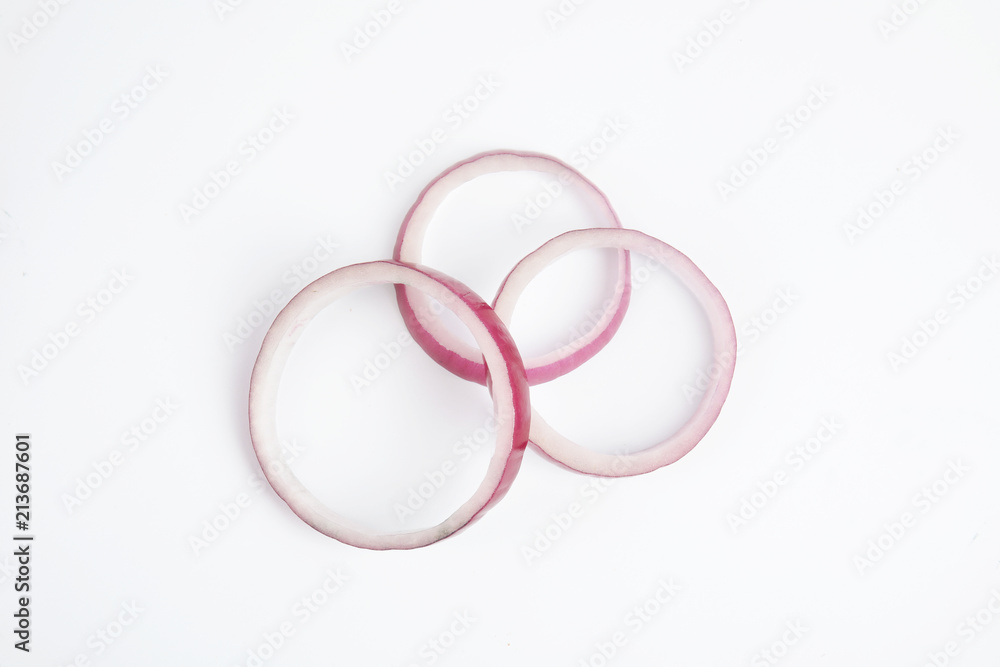 Fresh slices of red onion on white background Fresh slices of red onion on white background