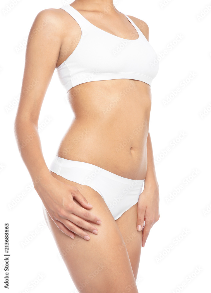 Young woman showing smooth skin after bikini epilation on white background
