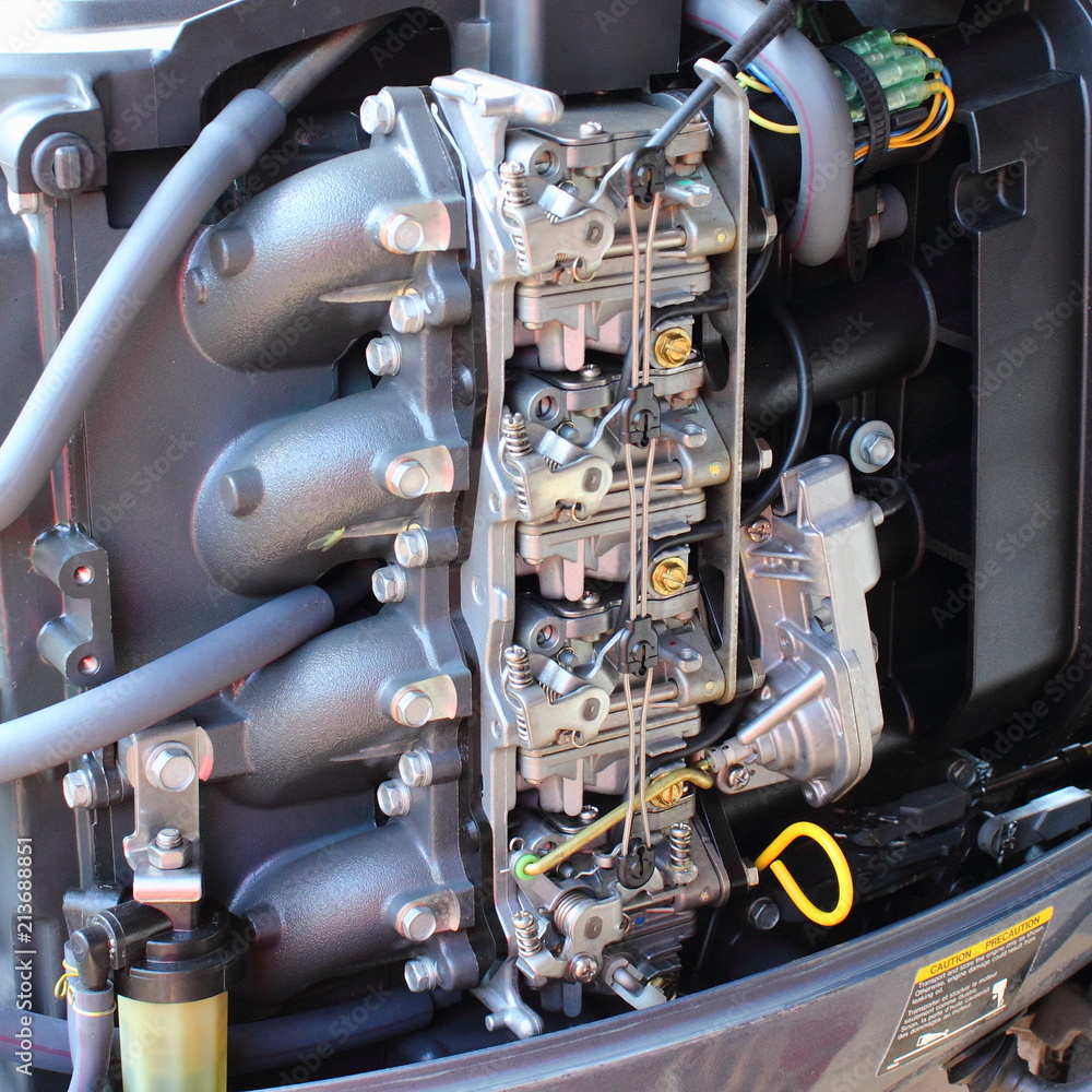 Four carburetors, intake manifold, fuel filter and cold start mechanism