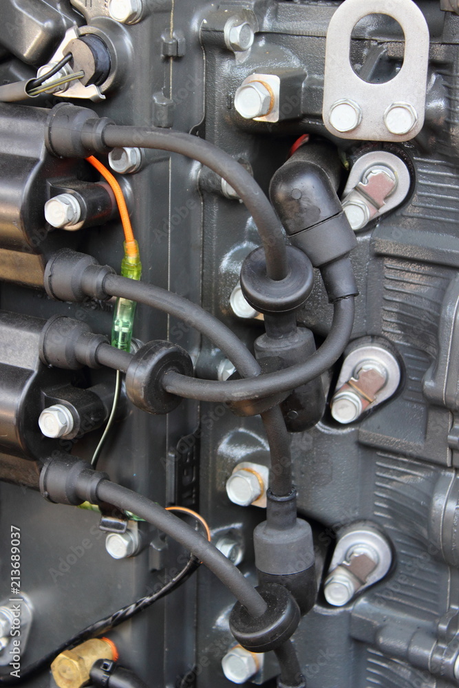 High voltage wires with tips and ignition coils on fourcylinder