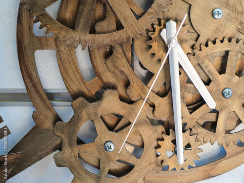 timber clock on the wall made of wheel