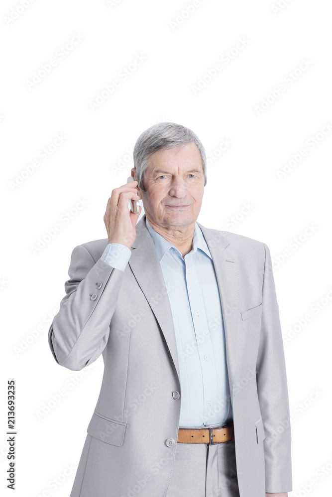confident senior businessman with mobile phone.i confident senior businessman with mobile phone.i
