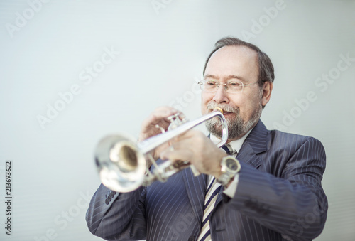 professional musician performs a musical composition on the pipe