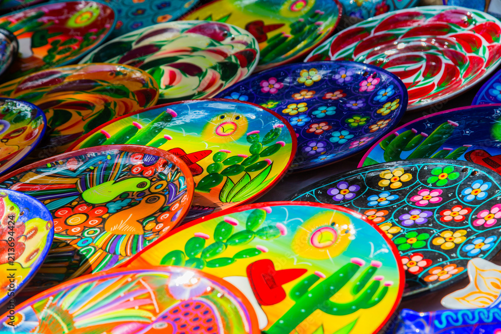 Plates in the traditional Mexican style. Souvenirs from Chichen Itza, Yucatán, Mexico. Plates in the traditional Mexican style. Souvenirs from Chichen Itza, Yucatán, Mexico.