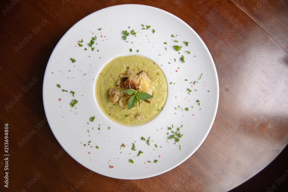 Fresh soup with ham in a plate Fresh soup with ham in a plate