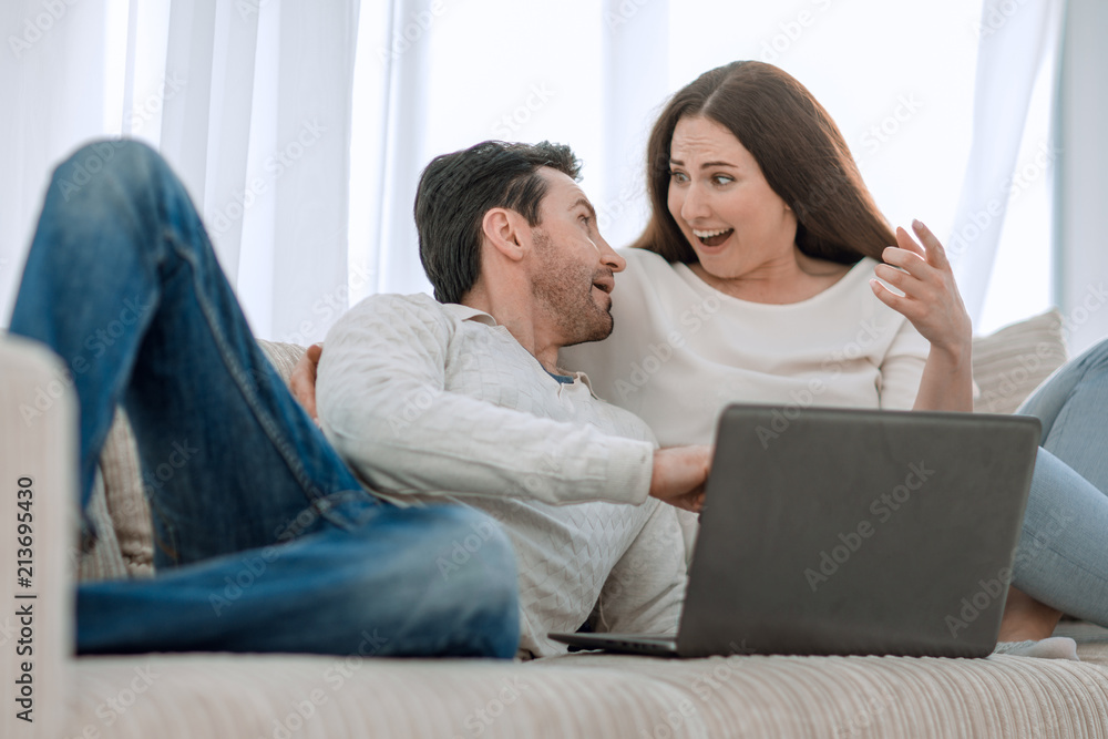 young couple is rooting for their favorite team young couple is rooting for their favorite team