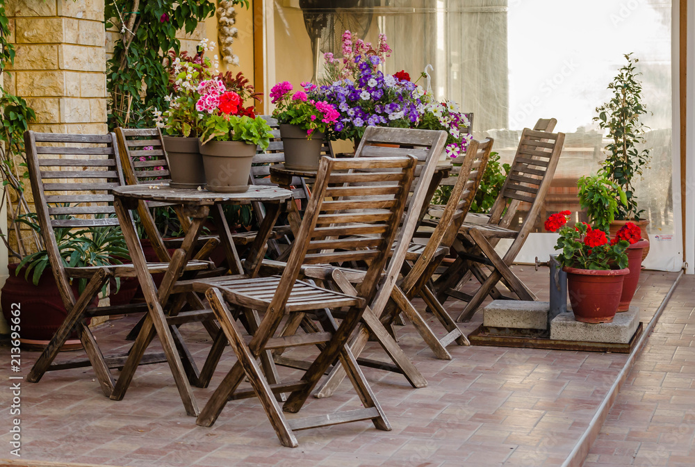 Chairs in the garden restaurant in Leptokaria, Greece 