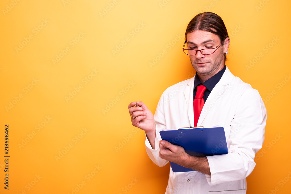 Male doctor concluding diagnosis prescription Male doctor concluding diagnosis prescription