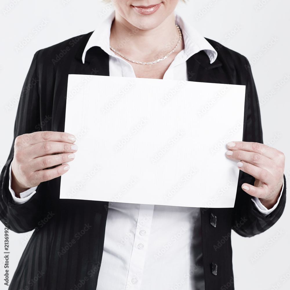 closeup.business woman holding a blank sheet. closeup.business woman holding a blank sheet.