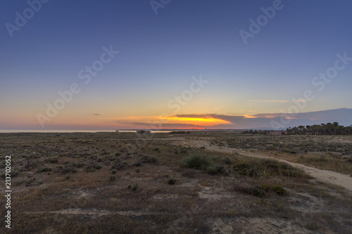 Sunset seascape of Salgados beach in Albufeira  Algarve.