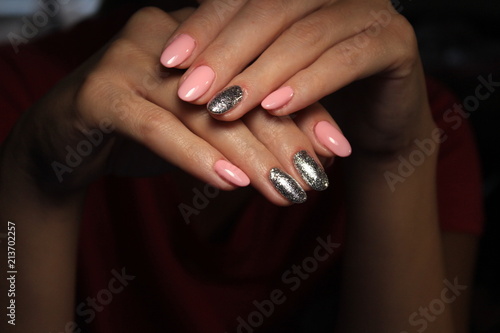 pink manicure with a design