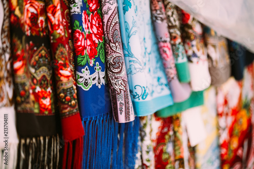 Rows Of Traditional Russian Colorfull Scarfs And Headscarfs In Market © Grigory Bruev