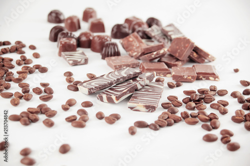 close up.set of chocolate bars and coffee beans. isolated on whi