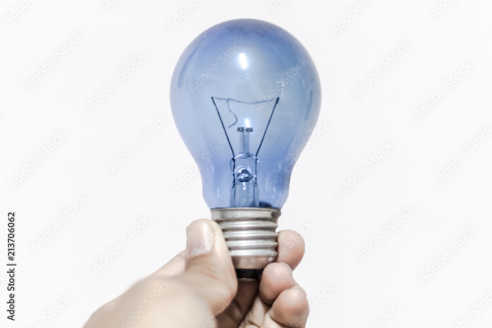 light bulb blue in hand white background light bulb blue in hand white background