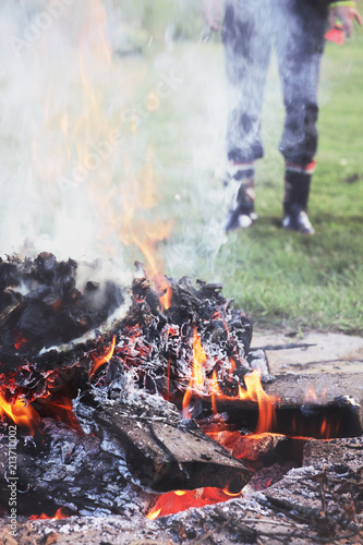 Burning firewood in bonfire