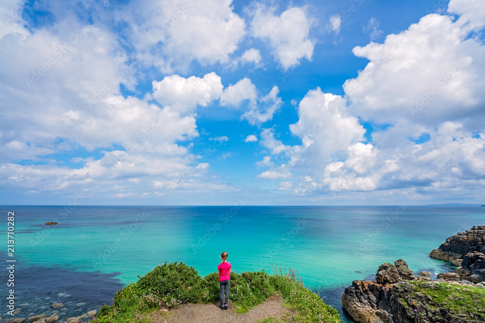 Cute little girl on the Cornish coast