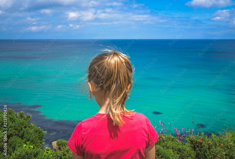 Cute little girl on the Cornish coast Cute little girl on the Cornish coast