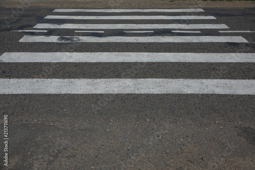 Zebra cross walk on asphalt road