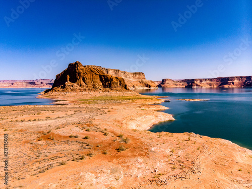 Aerial view of Lake Powell near Navajo Moutain, San Juan River in Glen Canyon with clear, beautiful skies, buttes, hills and water