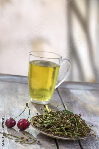 brewing, duretic, cherry tails medicine, healthy, herbal tea, virtues on wooden table photo