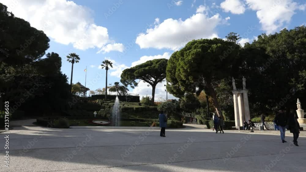 Video „Timelapse Catania Sicily Italy Green park with palm trees and water fountain. Main city