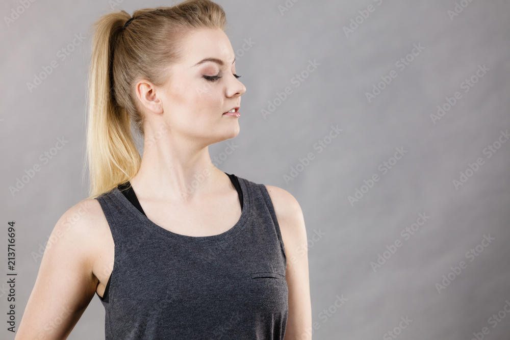 Happy woman wearing black tank top Happy woman wearing black tank top