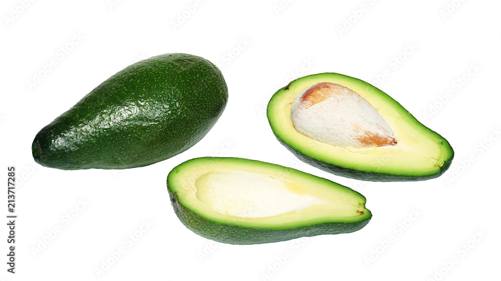 Two avocado, the whole and cut in half with bone on white background, isolated Two avocado, the whole and cut in half with bone on white background, isolated