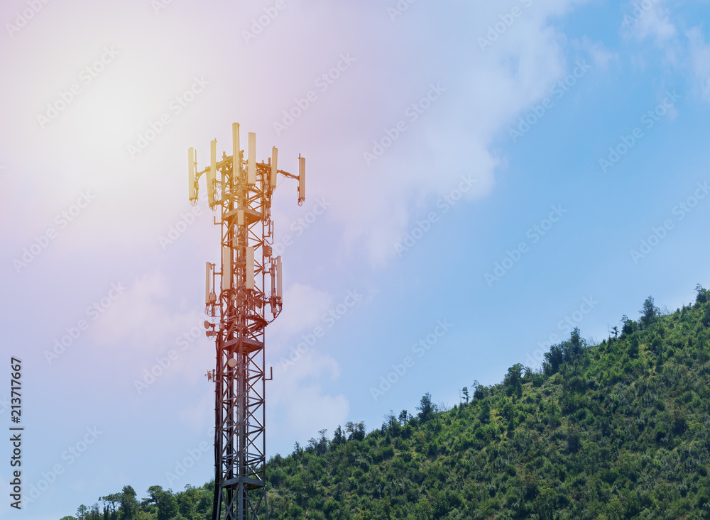 Telephone tower. Cellular phone antenna with sky background.