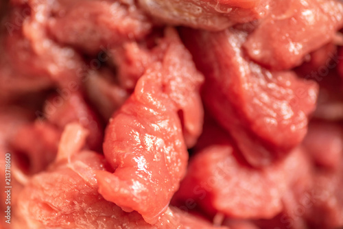 Extreme closeup view sliced raw beef meat