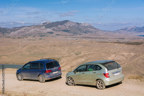 Fototapeta Naklejka Na Ścianę i Meble -  Cars is driving on the mountain Meganom. Republic of Crimea