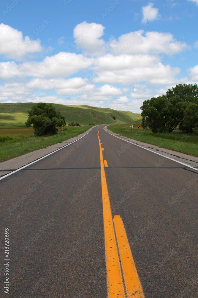 Road trip down a remote rural highway 2 in Nebraska