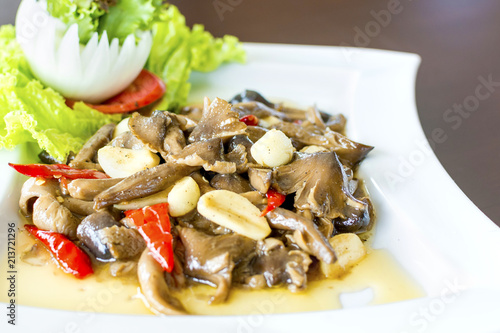Ehedocn mushrooms fried with oyster sauce the favorite delicious Thai food #213721296
