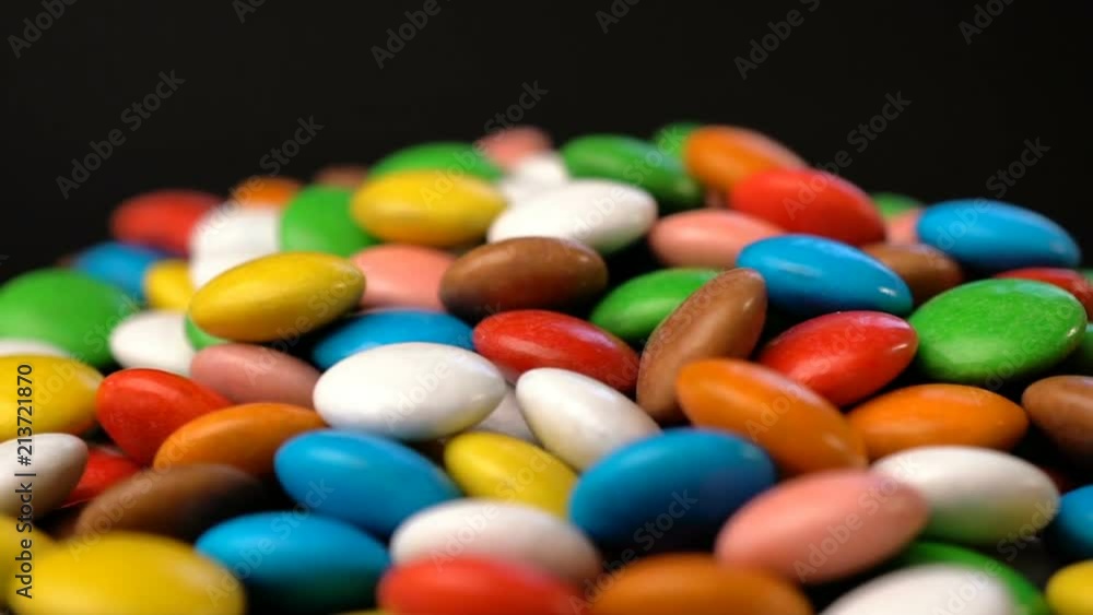 Colorful chocolate candy rotate background. Colorful chocolate candy rotate background.