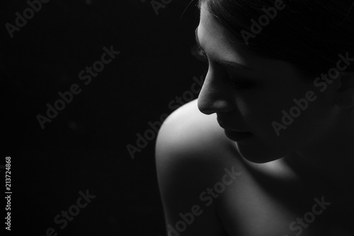 Black and white fashion art studio portrait of beautiful elegant woman. © chotiga