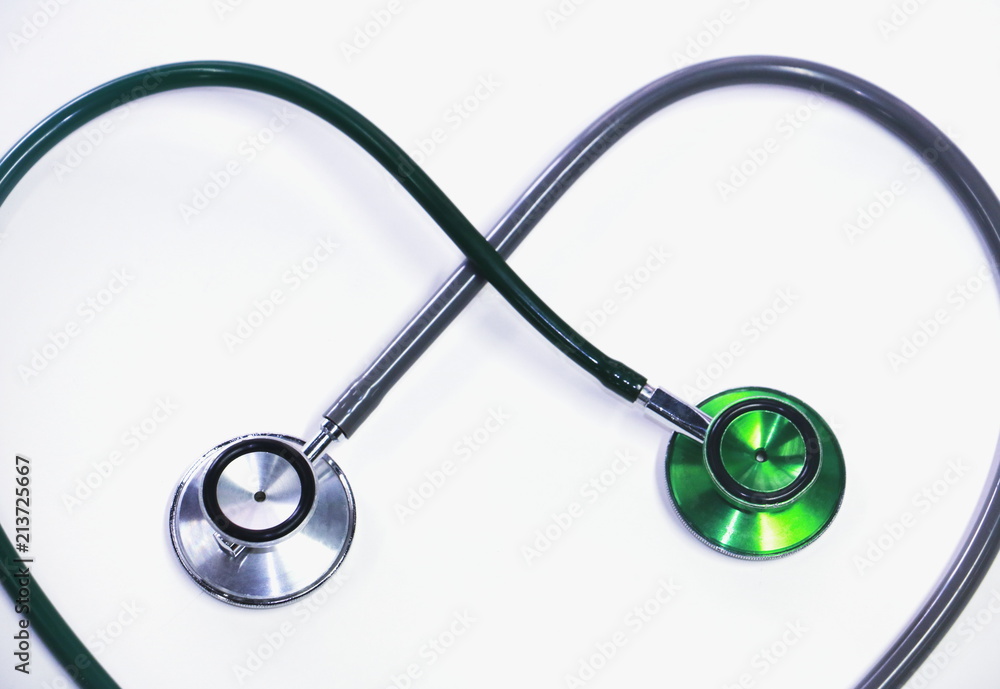 Green and silver stethoscope. Stethoscope check heart .Stethoscope show good health and caring concept. 