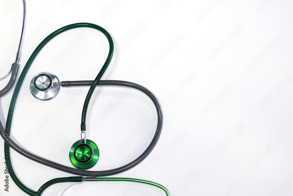Green and silver stethoscope. Stethoscope check heart .Stethoscope show good health and caring concept. Green and silver stethoscope. Stethoscope check heart .Stethoscope show good health and caring concept.
