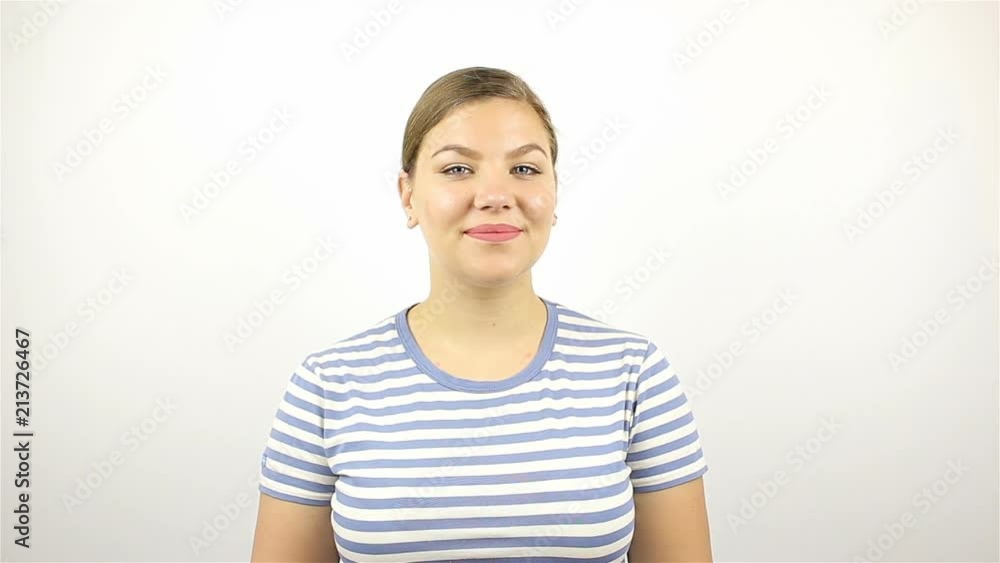 Portrait of a young beautiful woman. Smiling looking at camera. close-up. Portrait of a young beautiful woman. Smiling looking at camera. close-up.