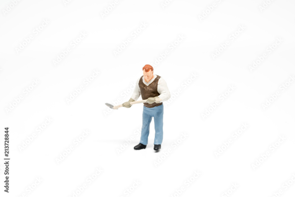 Miniature people cleaning up concept on background with a space for text