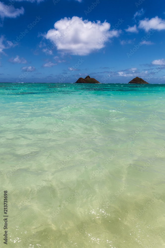 Clear turquoise water and two islands view at Lanikai beach, Oahu, Hawaii