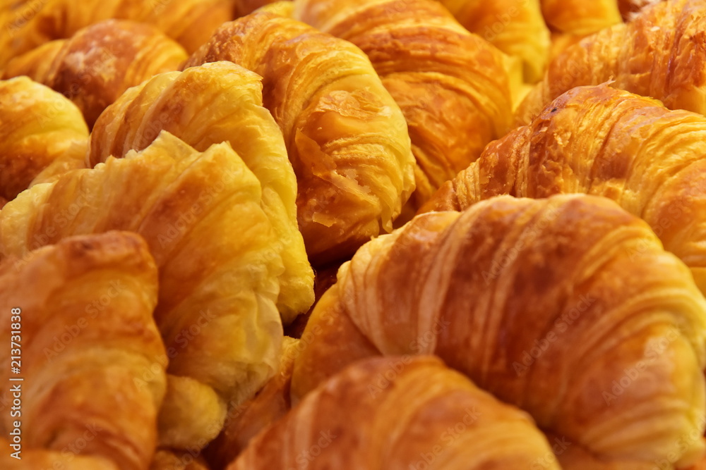 A seamless background of mouth-watering pastry rolls. Close-up