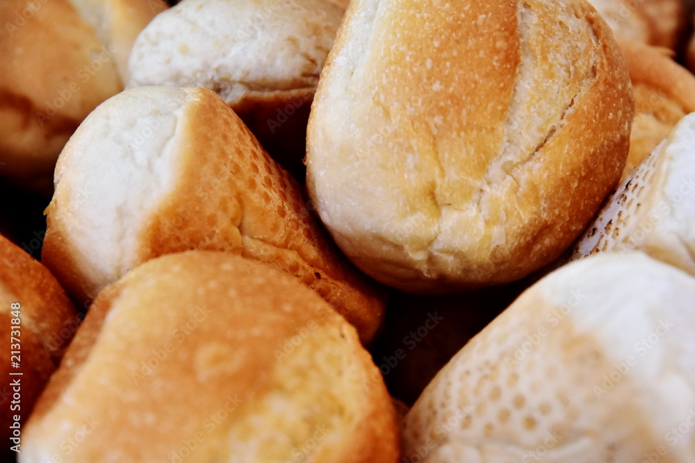 A seamless background of mouth-watering rolls. Close-up