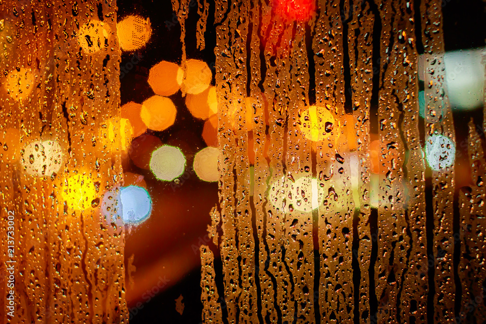 Drops Of Rain Water In Or Evening Street Lights On Red Glass Background. Bokeh Boke Lights Out Of Stock Photo | Adobe