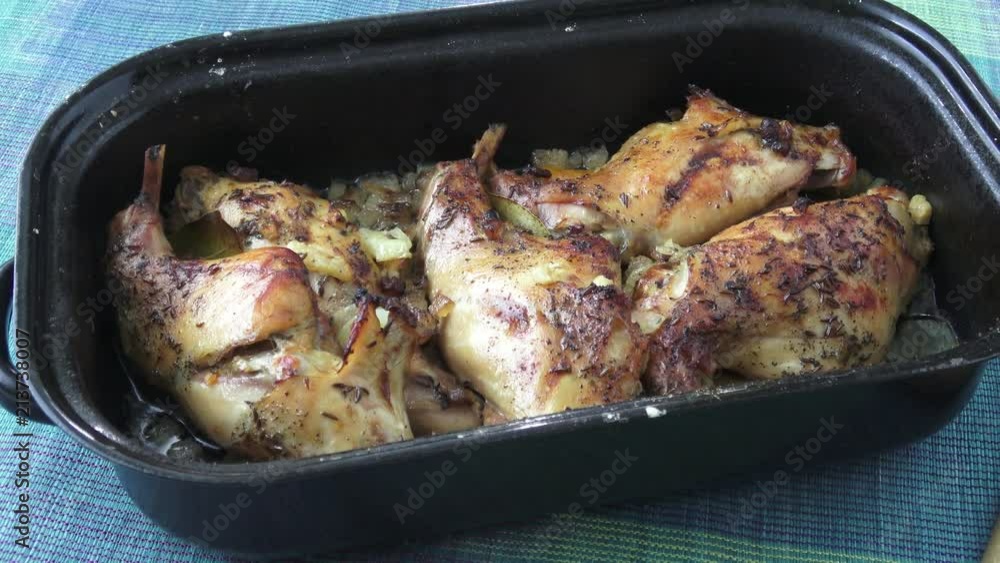 Roasted rabbit leg. Dietary meat, flavored rabbit, baked with spices and vegetables
Roasted rabbit leg. Dietary meat, flavored rabbit, baked with spices and vegetables