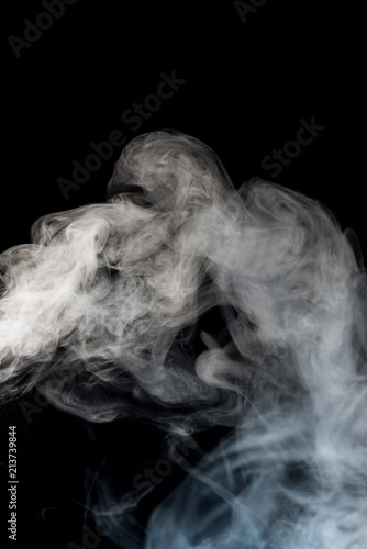 White smoke isolated on black background.