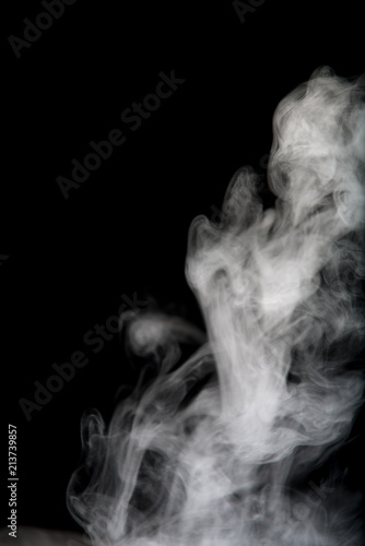 White smoke isolated on black background.