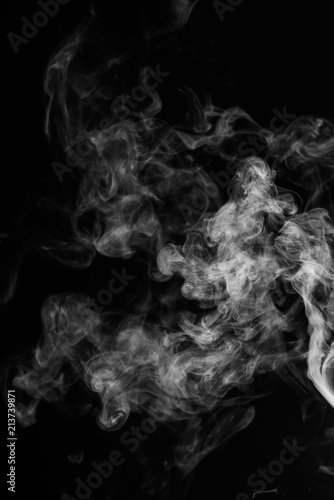 White smoke isolated on black background. © joesayhello